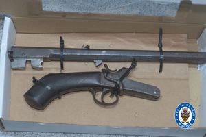 Loaded sawn-off shotgun recovered from the car 