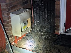 Supporting image for story: Fire service warning after discarded wax sparks Oswestry bin fire near gas supply