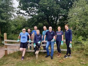 Supporting image for story: Specsavers volunteers help out at Rifle Range