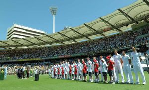 England and Australia line up for the national anthems
during day one of the first Ashes Test at The Gabba, Brisbane, Australia.