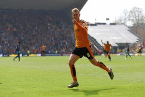George Saville celebrates after making it 2-0
