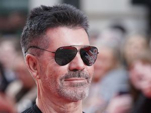 Supporting image for story: Simon Cowell says becoming a father saved his life after death of parents