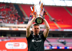 Luton Town manager Rob Edwards celebrates with the trophy after winning the Sky Bet Championship play-off final
