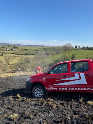 Firefighters tackle a fire in the open. Picture: SRFS.