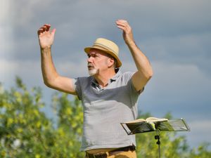 Supporting image for story: Singers meet again for outdoor rehearsal
