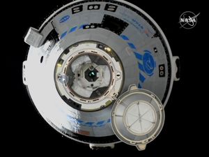 Supporting image for story: Boeing docks crew capsule to space station for first time