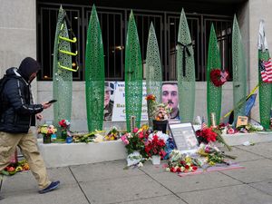 Supporting image for story: National Guard member shot in attack has shown positive signs, governor says