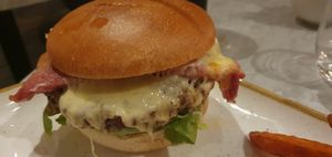 A burger with a lot of taste and texture to it