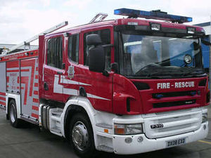 Supporting image for story: Woman led to safety after handbag catches fire