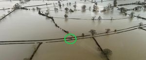 Mr Jones was surrounded by floodwater. Picture: Dyfed-Powys Police