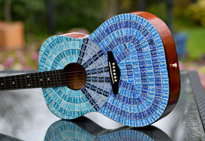 Peter Mason's stamp-covered guitar