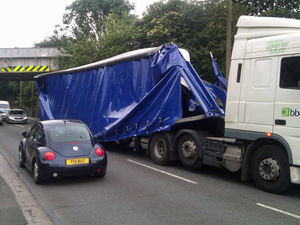 Supporting image for story: Lorry ploughs in to bridge on main road