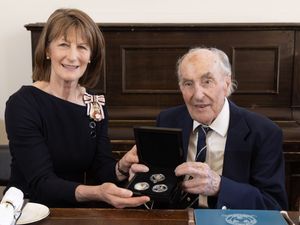 VE Day Veteran Colin Cole is honoured by Lord Lieutenant of Shropshire, Anna Turner. Picture: Shropshire Council.