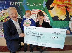 Mark Hayward with HLC pupil Eoghan Lloyd and pastoral manager Claire Caddick