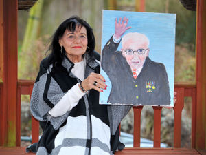 Supporting image for story: Captain Tom takes pride of place