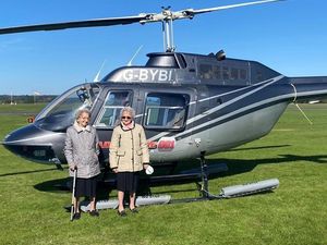 Supporting image for story: Special family flight for Tipton twins Lilian and Doris