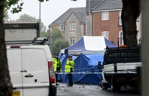 Police launched an investigation after a man was shot dead in Well Lane and another man was injured