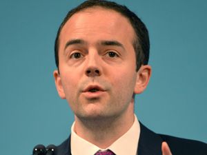 James Murray making a speech