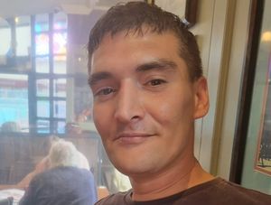 Supporting image for story: Man charged with murder after stabbing as family pay tribute to 'loving son and father' 