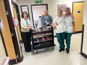 Amanda and Jenny welcome Christine and volunteer Matthew Hughes onto the ward.

