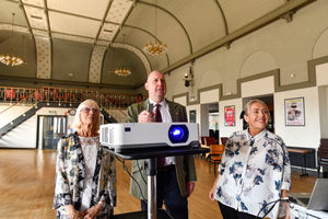 Garrison Sergeant Major Andrew 'Vern' Stokes of the Coldstream Guards is back in his home town of Madeley in Shropshire. He will be appearing at the Anstice Hall in Madeley to give his talk called 'Beneath the Bearskin. Vern is pictured doing a sound test at the Anstice with the Manager Lydy Boden and Viv Moore. Picture: Dave Bagnall