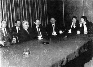 Rev William Lynn, far right, in the boardroom of the steelworks
