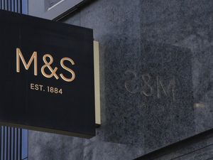 An M&S sign outside a shop
