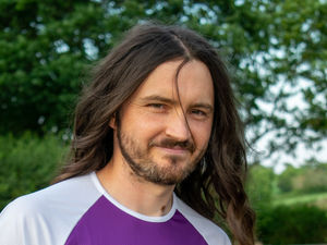 Supporting image for story: Long-haired man cuts his locks for charity and will walk 50 miles to donate it