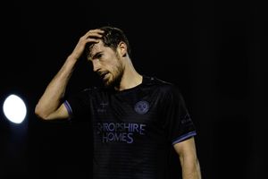 A dejected Sam Stubbs of Shrewsbury Town