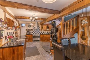 The main property features a bespoke kitchen. Photo: Mannleys/Zoopla