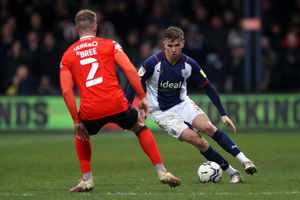 Conor Townsend  of West Bromwich Albion and James Bree of Luton Town during the Sky Bet Championship match between Luton Town and West Bromwich Albion at Kenilworth Road on February 19, 2022 in Luton, England. (Photo by Adam Fradgley/West Bromwich Albion FC via Getty Images).