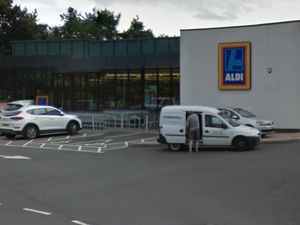 Supporting image for story: Masked robbers steal case of cash then escape in getaway car