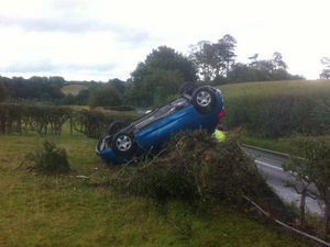 Supporting image for story: Driver has lucky escape after car ends up on roof near Oswestry