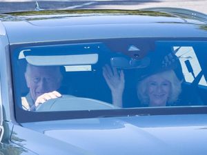 Supporting image for story: Charles drives Camilla to Sunday church service