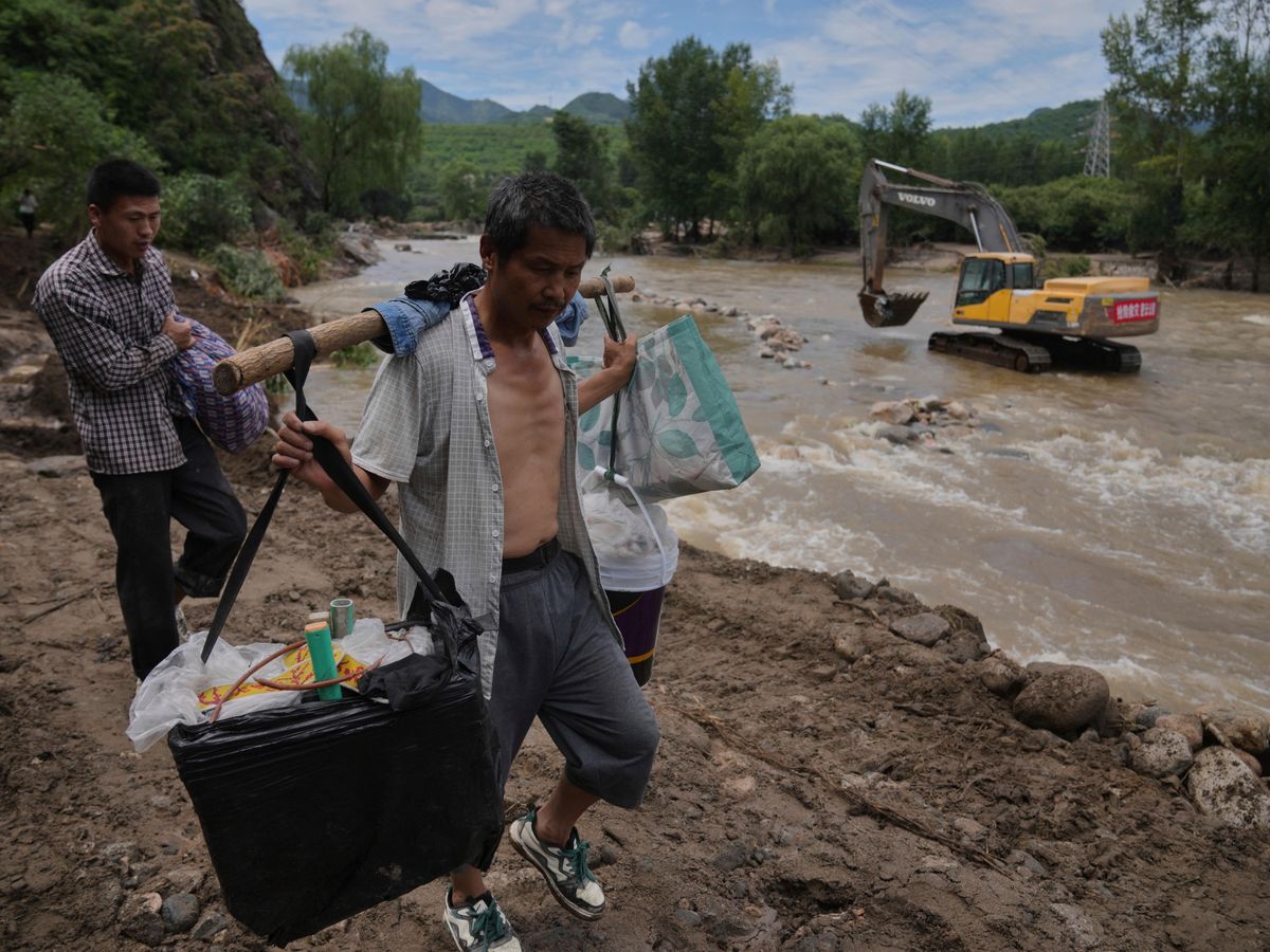 Dozens dead after flooding and landslides near Beijing