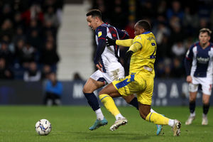  Callum Robinson of West Bromwich Albion and Ryan Nyambe of Blackburn Rovers  during the Sky Bet Championship match between West Bromwich Albion and Blackburn Rovers at The Hawthorns on February 14, 2022 in West Bromwich, England. (Photo by Adam Fradgley/West Bromwich Albion FC via Getty Images).