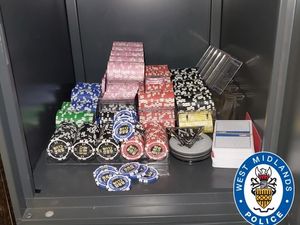 Supporting image for story: Weapons, drugs and cash seized from an illegal Birmingham gambling den as police execute a warrant