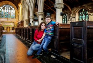 George Bull, nine, with his mum Caroline.