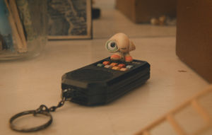 Marcel The Shell With Shoes On: Marcel (voiced by Jenny Slate) on a remote control