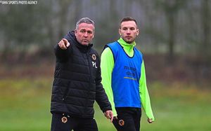Paul Lambert manager / head coach of Wolverhampton Wanderers speaks with Andreas Weimann
