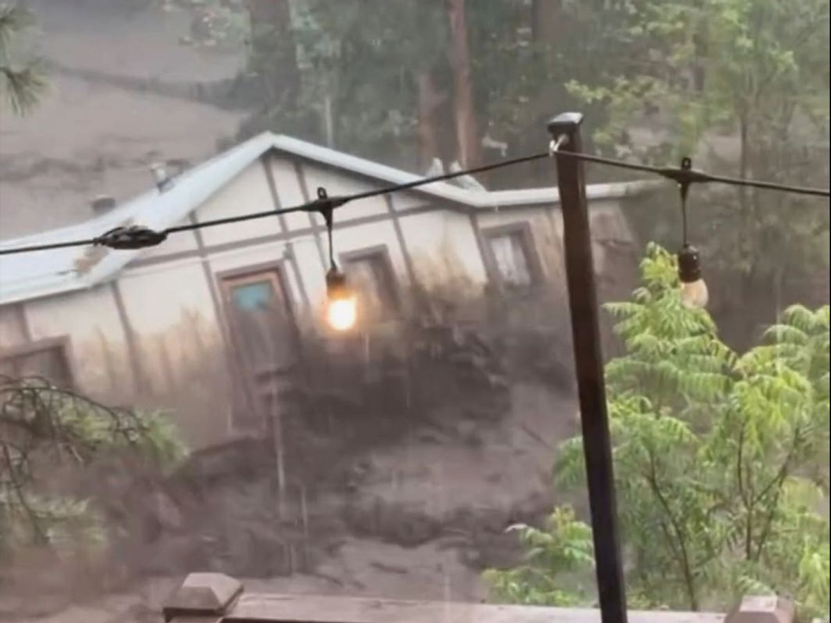 Three missing and house swept away as flash flooding hits mountain village in US