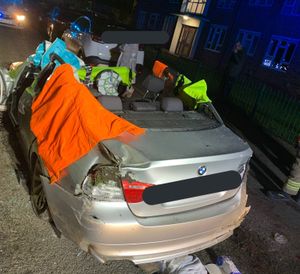 Two men had to be freed from the car by firefighters following the crash. Photo: @WMFSFallingsP