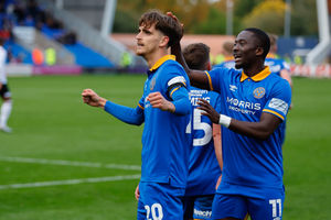 Tom Bayliss of Shrewsbury Town celebrates with his team mates after scoring a goal to make it 1-0 (AMA)