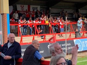 The group enjoy a game in the terracing in the North Stand