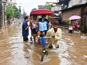 Supporting image for story: Flash flooding and landslides kill 22 in north-east India