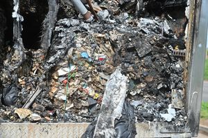 Rubbish inside an abandoned trailer on the A41 near Market Drayton that was destroyed in a fire. 