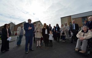 Dennis' brother, Bert Turner, speaks, watched by Dennis' widow, Patricia Turner, daughter Jenny Mullings, and grandaughter Bella Mullings