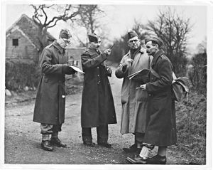 A pictures of the Home Guard School, Claverley, taken in the 1940s. Handwritten on the back of the original print is 'The men were planning out the defence of the village.'