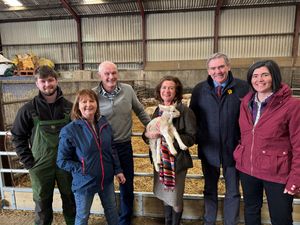Pictured (L-R) the host family of Daniel Evans, Eryl Evans and Dai Charles Evans; First Minister of Wales, Eluned Morgan MS; NFU Cymru President, Aled Jones; and NFU Cymru Deputy President, Abi Reader