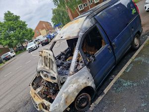 A van in The Crescent on Friday morning